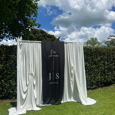 Draped backdrop with customised signage